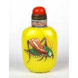 A Chinese enamelled milk glass snuff bottle decorated with crickets with gilt and coral stopper,
