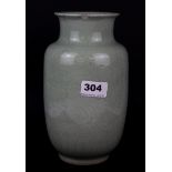 A 20th century Chinese incised celadon glazed porcelain vase, H. 22cm. Small rim chip.