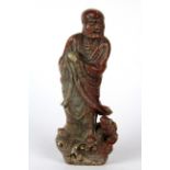 An early 20th century Chinese soapstone figure of an Arhat, H. 15cm.