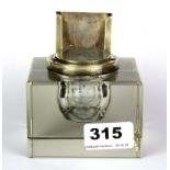 A hallmarked silver mounted desk inkwell with calendar slot, size 9 x 9 x 10cm.