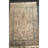 A grey ground heavy quality washed wool Chinese rug, W. 167cm L. 265cm.