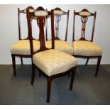 A set of four Mackintosh style mahogany dining chairs.