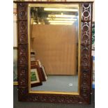 An unusual Victorian carved oak overmantle mirror with side shelves, W. 94cm H. 128cm.