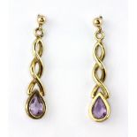 A pair of 9ct yellow gold drop earrings set with pear cut amethysts, L. 2.7cm.