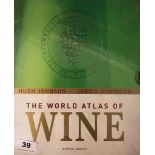 A copy of 'The World Atlas of Wine' by Hugh Johnson & Jancis Robinson.