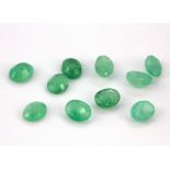 Ten unmounted oval cut emeralds, approx. 3.5ct, 5 x 4mm.