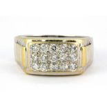 A gentleman's 18ct white gold (stamped 750) diamond set ring, (Z+1).