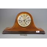 A 1930's inlaid Napoleon hat mantle clock, W. 51cm.