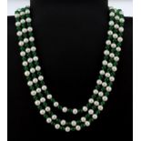 A cultured pearl and jade bead three row necklace on a 925 silver stone set clasp, L. 44cm.