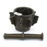 Islamic Interest. An early Persian bronze pestle and mortar, H. 11cm.