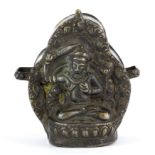 A small Tibetan hammered copper and white metal ga'u (portable shrine), W. 7.5cm H. 8cm.