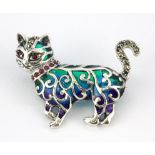 A 925 silver and marcasite enamelled cat shaped brooch set with rubies, L. 4 x 3cm.