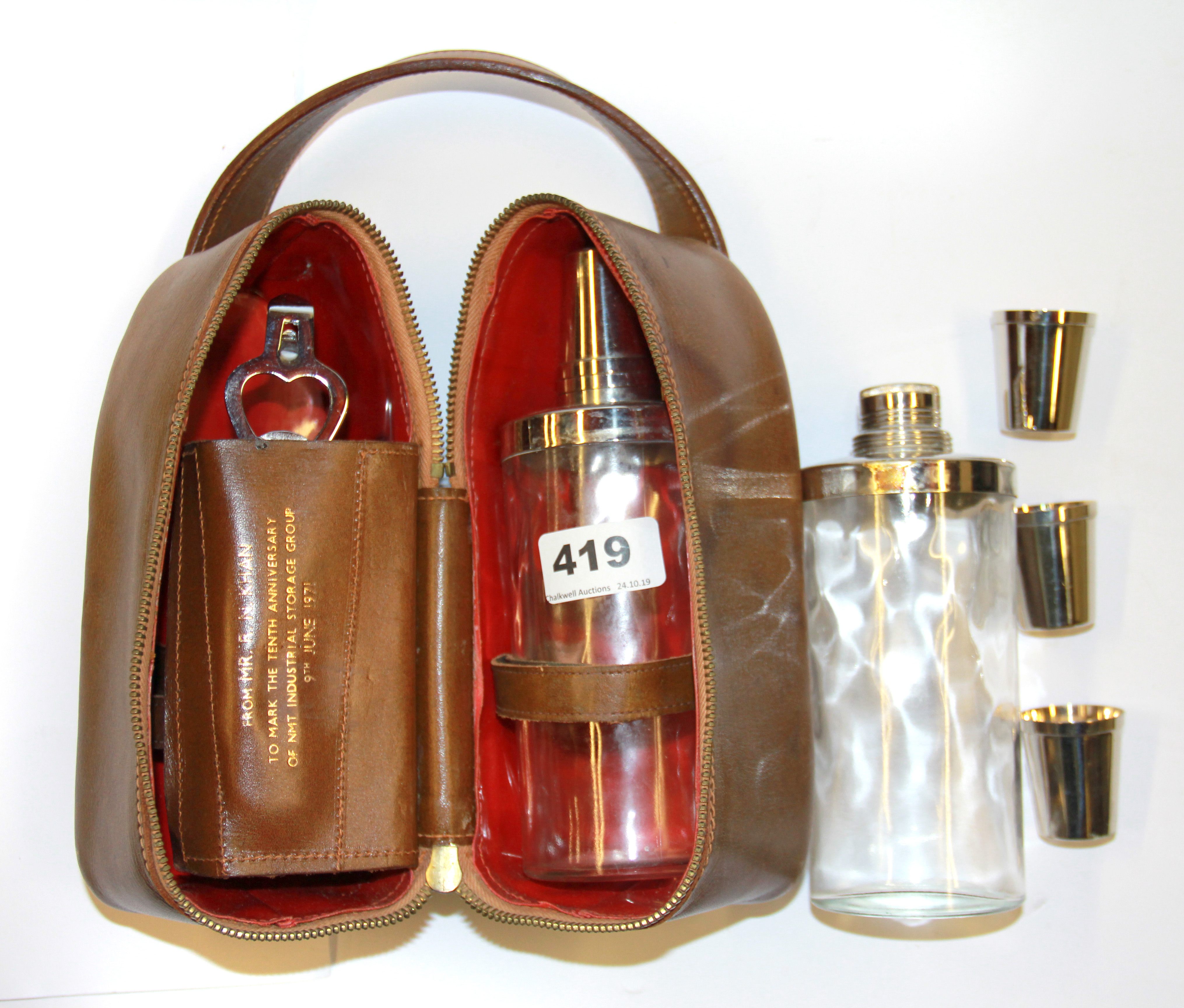 A pair of cased spirit flasks, H. 19cm.