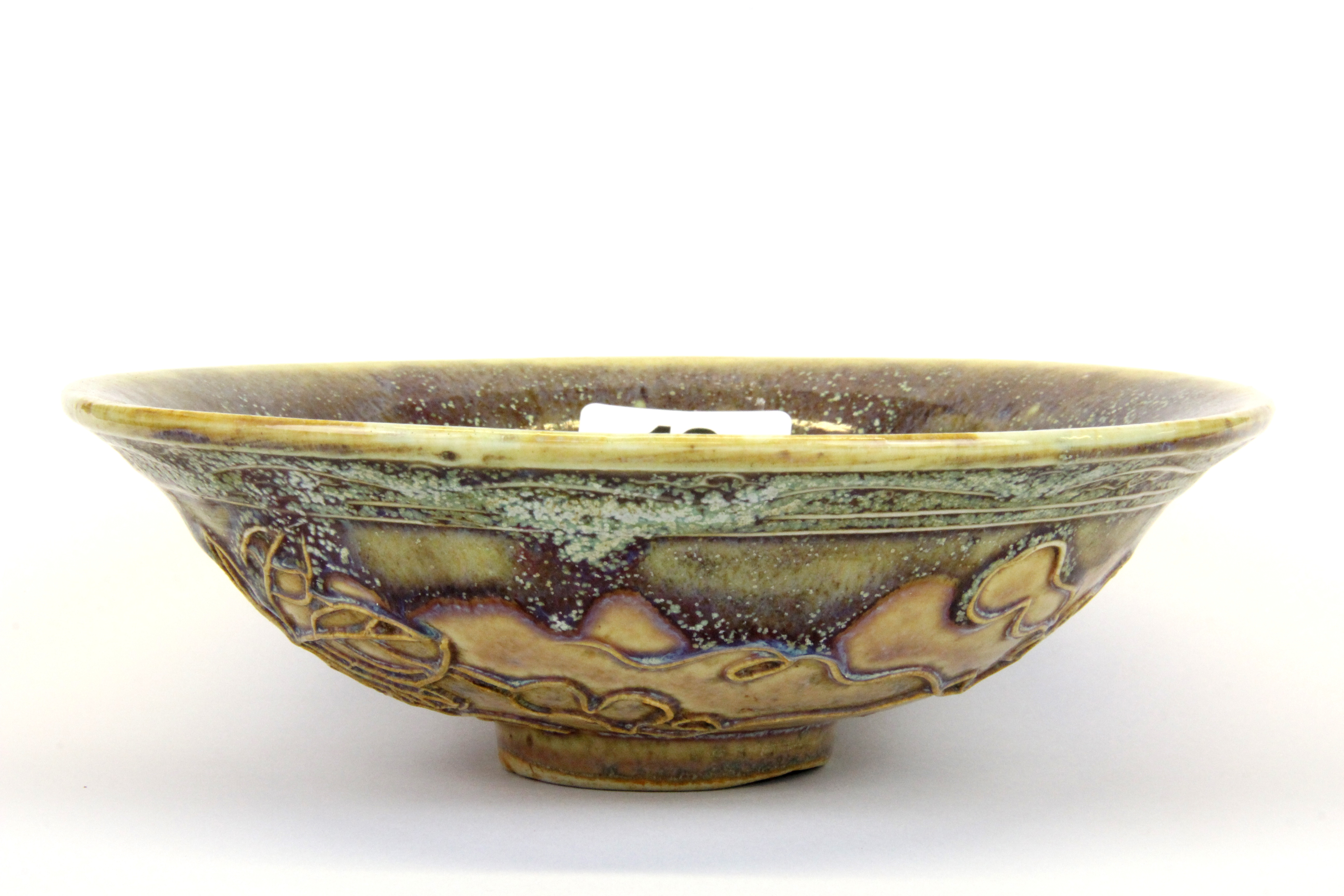 An interesting Chinese Zhun glazed porcelain bowl with tube lined decoration to the exterior, Dia.