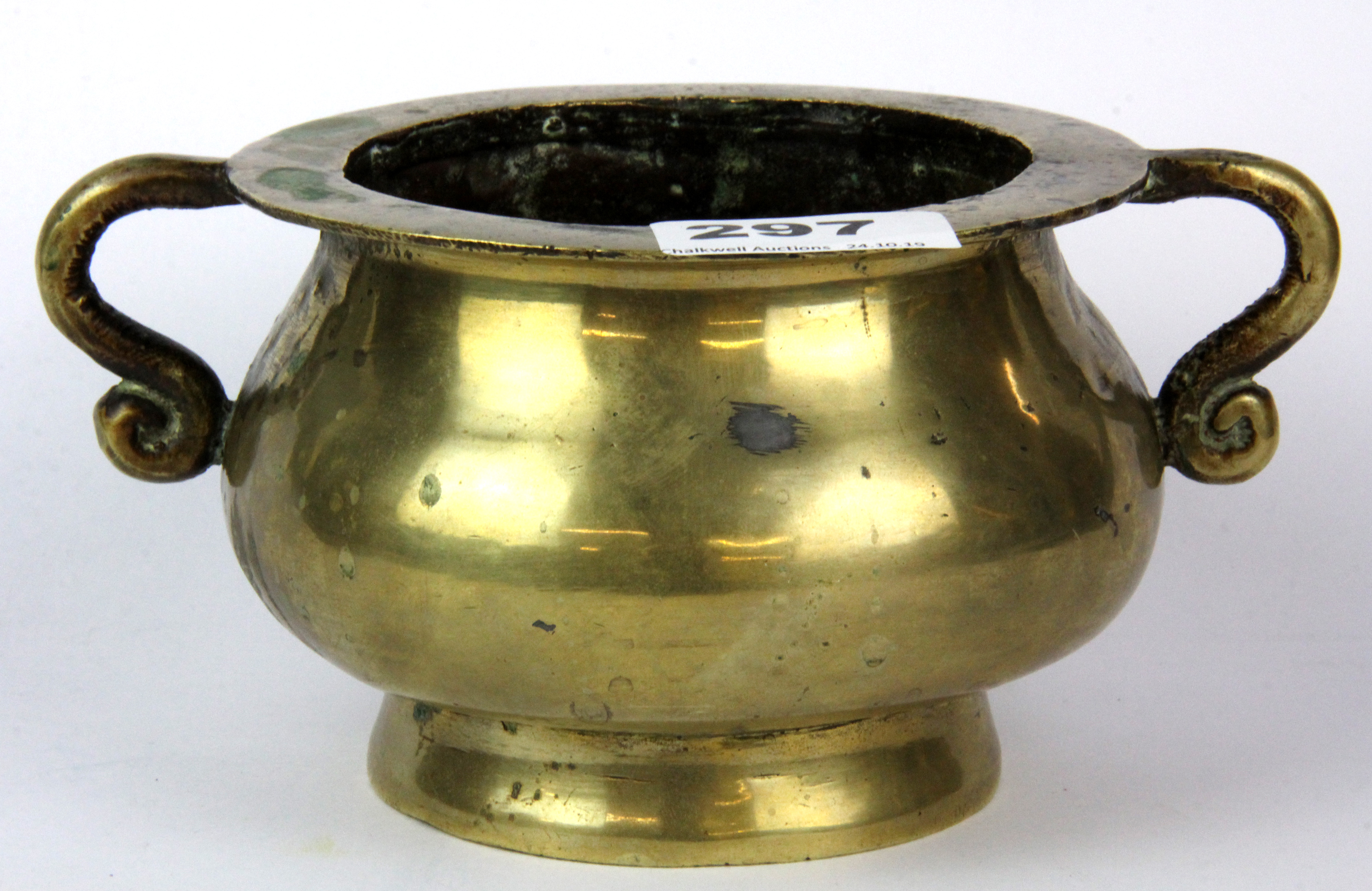 An early 20th century Chinese polished bronze censer, W. 18cm H. 9cm.