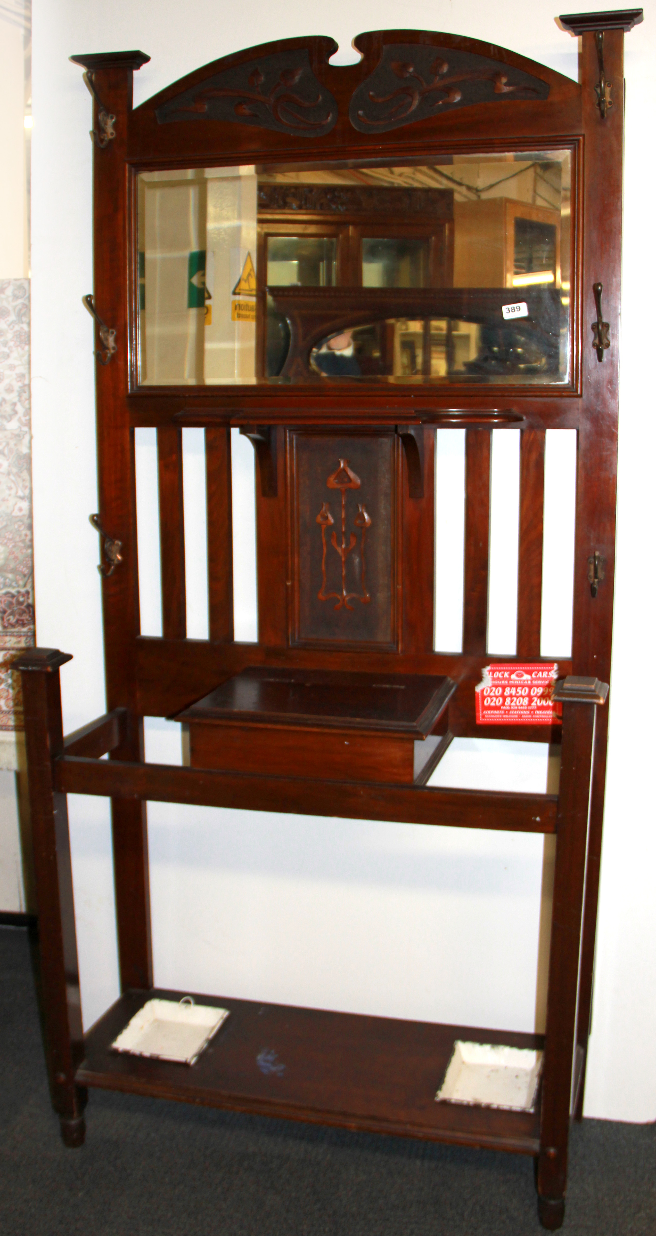 An Art Nouveau mahogany hall stand, W. 92cm H. 193cm.