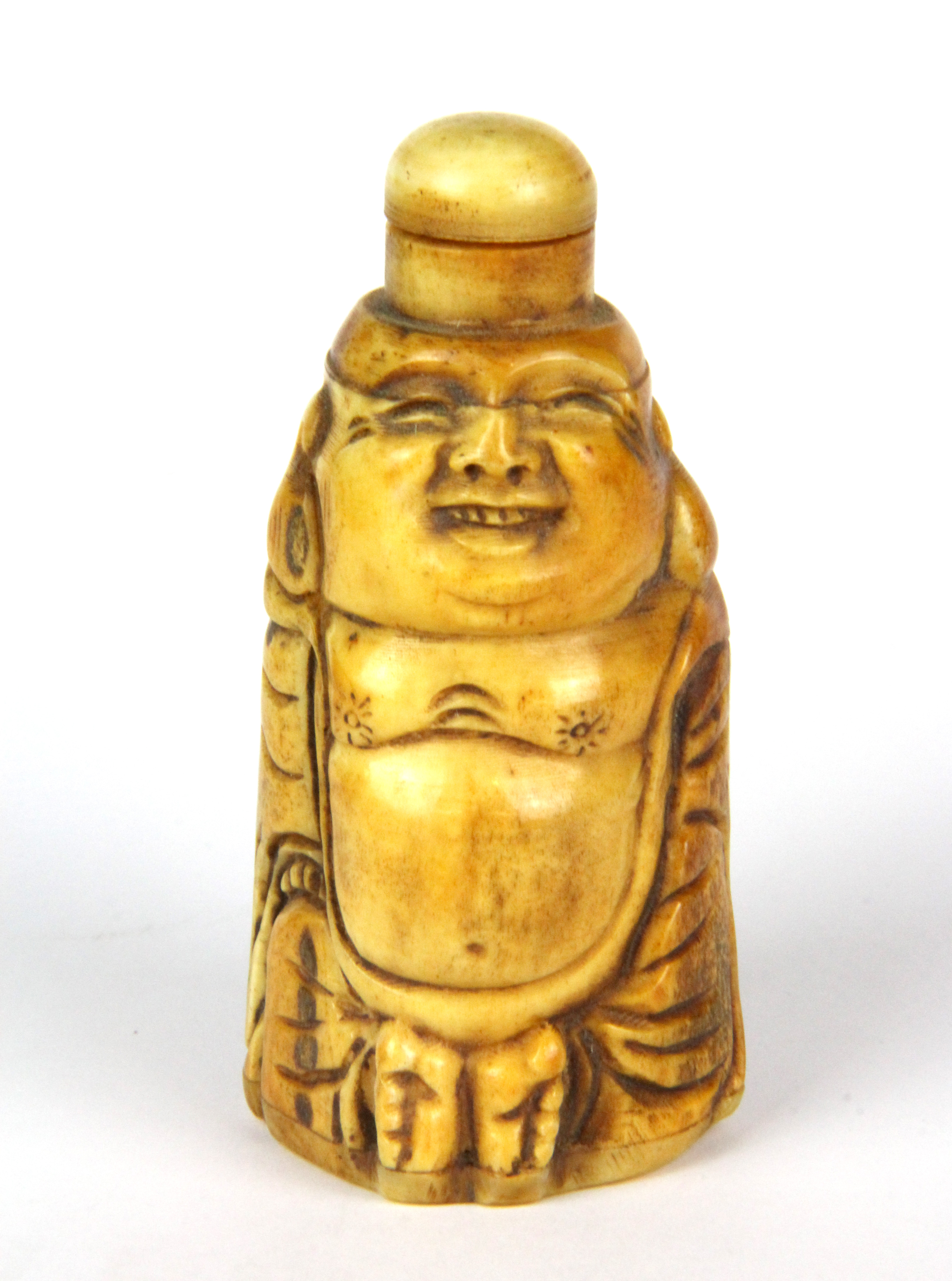 A carved bone snuff bottle of the happy Buddha, H. 8cm.