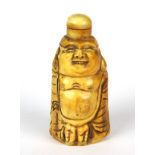 A carved bone snuff bottle of the happy Buddha, H. 8cm.