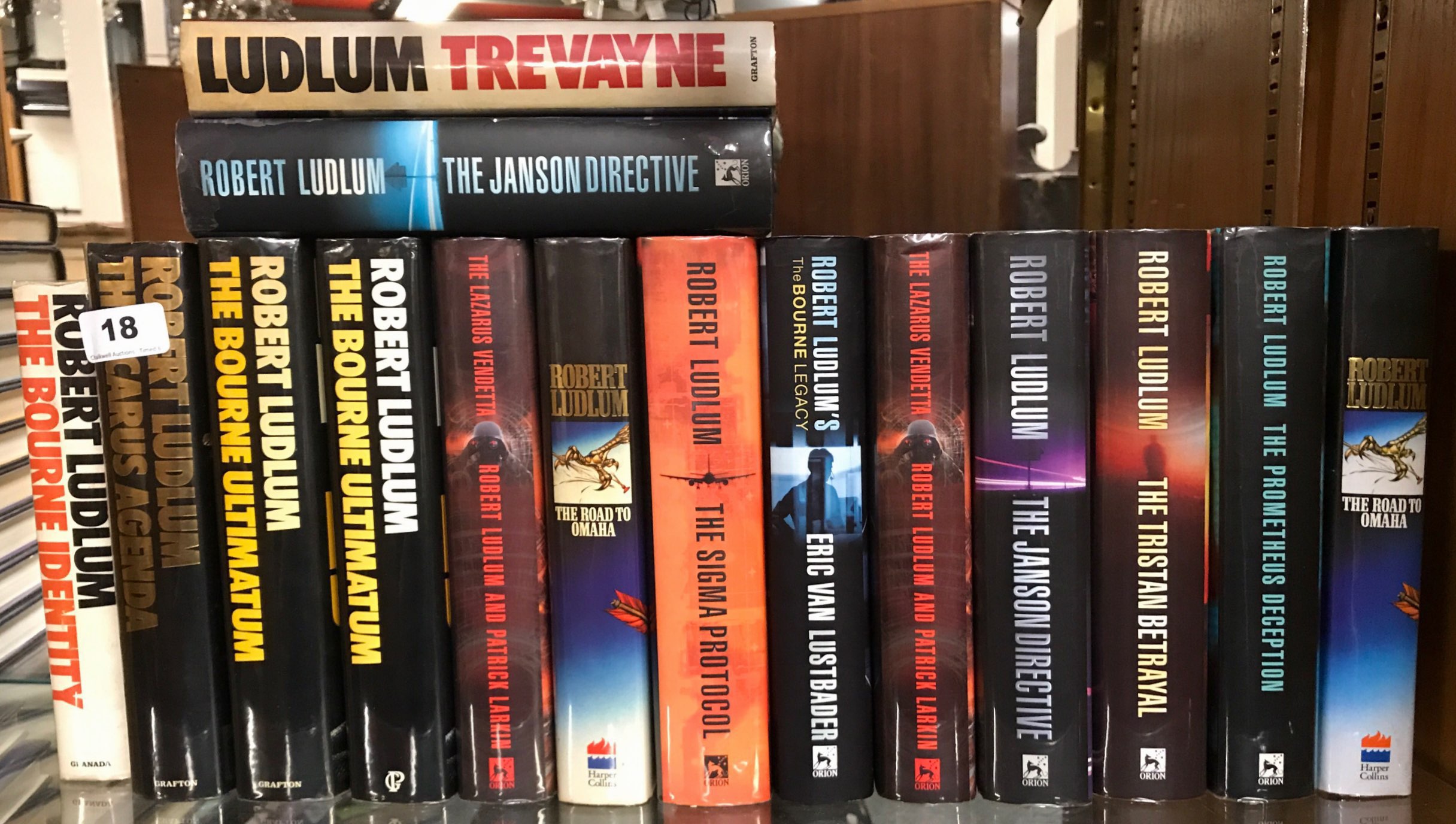 Thirteen books by Robert Ludlum including some first editions, together with a first edition of 'The