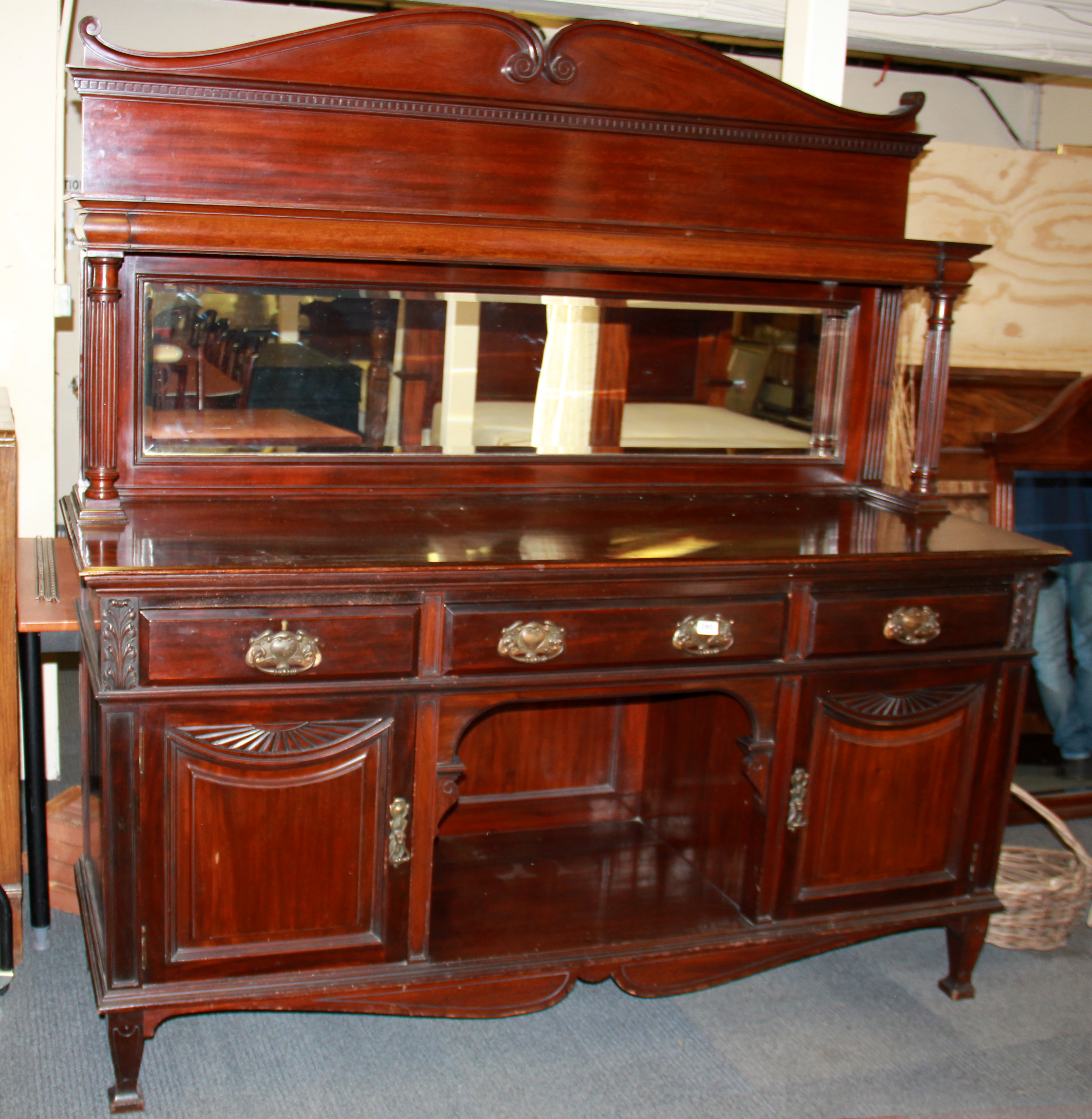 An Edwardian mirror backed mahogany sideboard, W. 183cm H. 198cm.