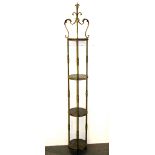 A wrought metal plant stand, H. 166cm.