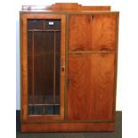 An Art Deco walnut veneered bureau cabinet, W. 83cm H. 196cm.