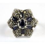 A 925 silver and marcasite sapphire set cluster ring, (N).