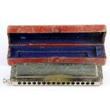 A boxed vintage M. Hohner, Larry Adler chromatic harmonica, W. 8cm.