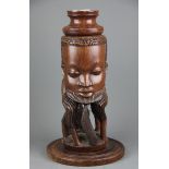 An African carved hardwood lamp base, H. 34cm.