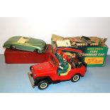 A boxed battery operated tin fire command car together with a boxed Harold Flory tin car, fire car