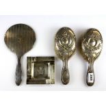 A hallmarked silver dressing table set together with a hallmarked silver ashtray.