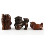 A Carved fruitwood netsuke of a mythical tortoise together with two further carved items.