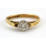 An 18ct yellow gold diamond set solitaire ring, (M.5).