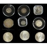 A group of nine mixed silver coins.
