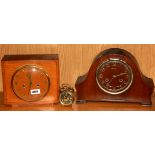 An Art Deco walnut veneered mantle clock together with further mantle clock and an alarm clock.