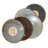 Five vintage cinematic film reels including Office of Civil Defense, 16mm reel Dia. 32cm.