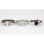 Three 925 silver stone set rings.