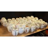 A very large collection of ceramic ginger jars and other pots and covers.