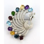 A 925 silver peacock shaped brooch set with pear cut amethyst, blue topaz, citrines, rodolite