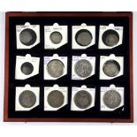 A group of 12 mixed silver coins.