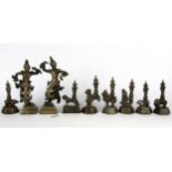 A collection of Indian bronze items, including a group of seven weights, tallest 16.5cm.