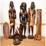 A group of African carved Tribal wooden figures, tallest 47cm.