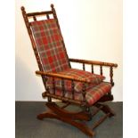 A 19th century American bobbin turned rocking chair.