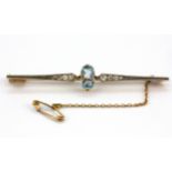 A yellow and white metal (tested high carat gold) bar brooch set with old cut diamonds and