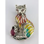 A 925 silver and marcasite enamelled cat brooch / pendant set with rubies, L. 4 x 3cm.