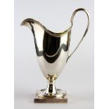 A hallmarked silver jug, H. 15cm.