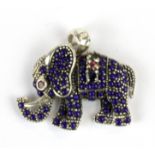 A 925 silver elephant shaped pendant set with lapis lazuli, ruby, sapphire and emerald,3 x 3.5cm.