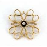 A 9ct yellow gold diamond set brooch, Dia. 2.6cm.