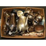 A box of silverplate and other items.