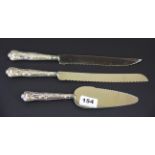 Three matching hallmarked silver handled serving knives.